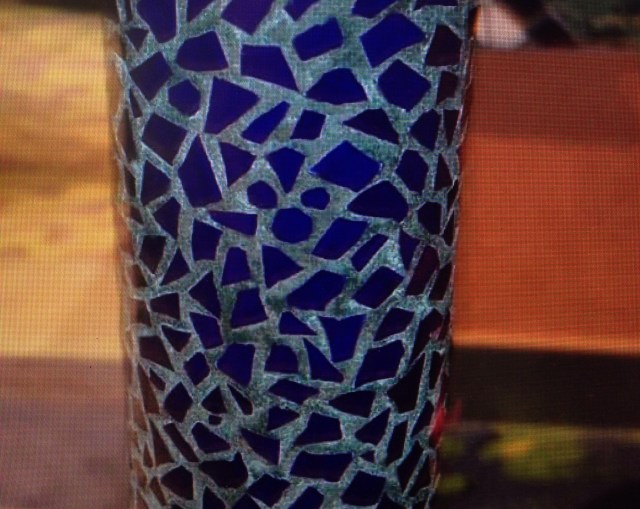 Hidden Mickey found in mosaic column at Coral Reef